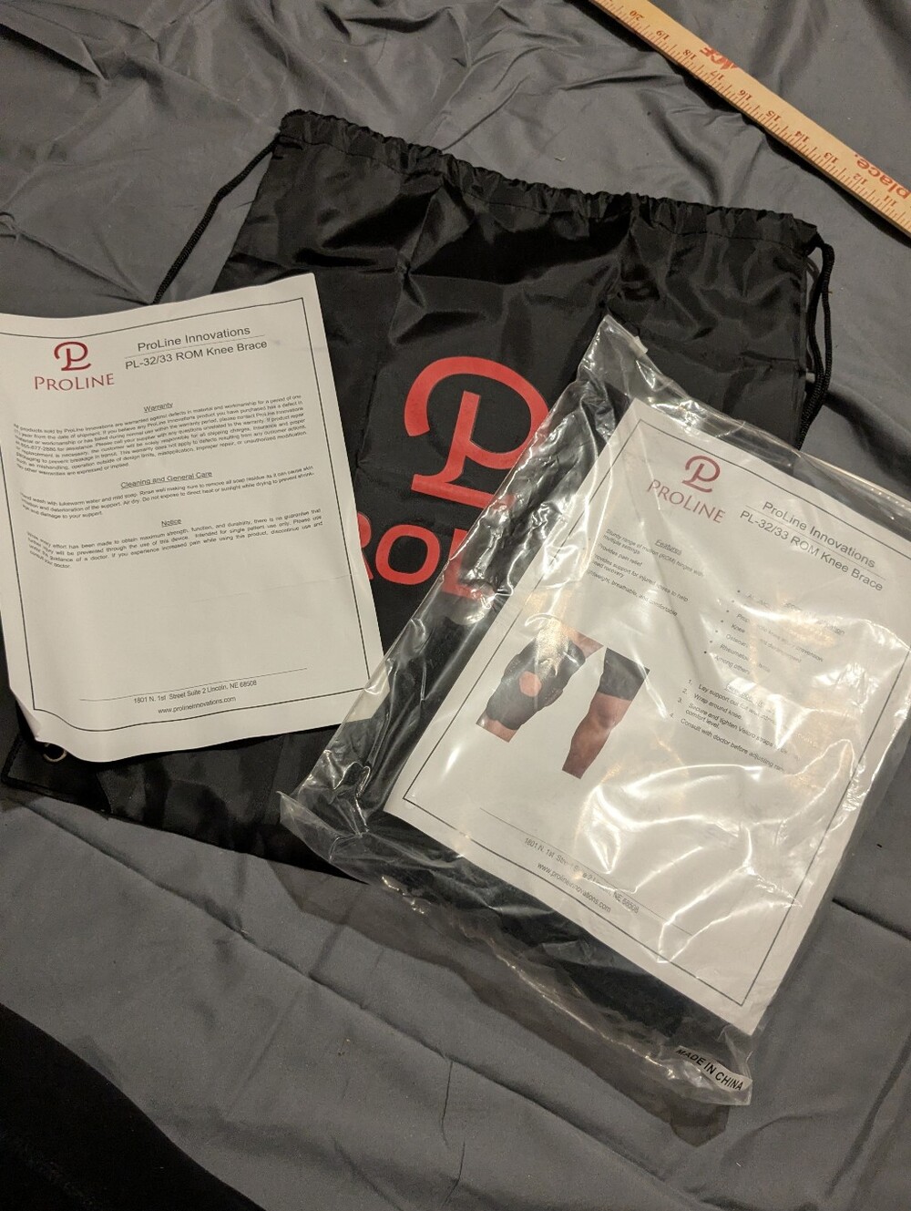 new proline knew brace with bag